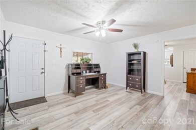 Entering the front door into the open living room