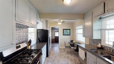 UPDATED KITCHEN W/GRANITE COUNTERS.