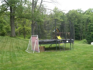 Land/Lot. The home is sited on 1/3 acre but looks 