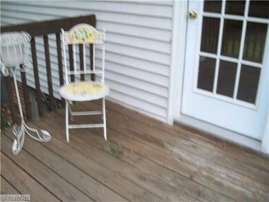 Patio/Deck. Deck over looks largr landscaped back yard.