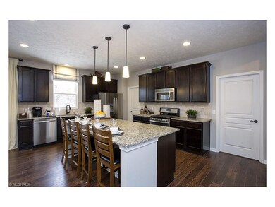 Large 4 person island, Maple cabinets, granite cou