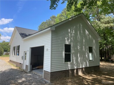 Siding complete; side load finished garage with wi
