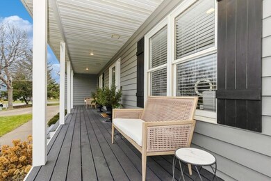Sit and relax on the front porch with maintenance free decking.