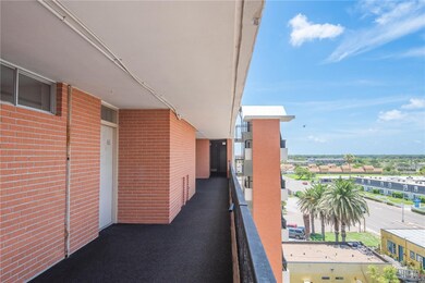 The walkway outside the front door of unit 65.