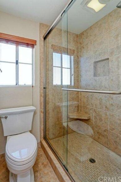 Large oversized shower with tile cut outs.