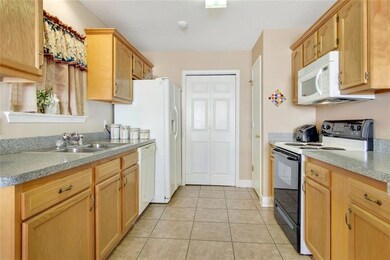Kitchen has full pantry and leads to Laundry room