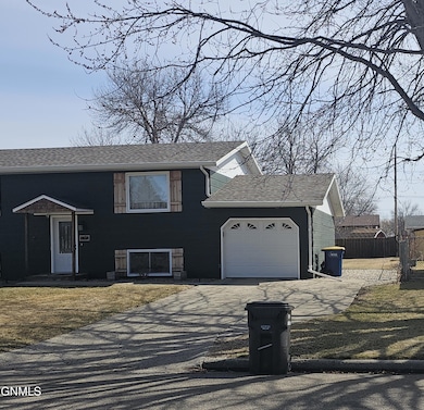 1810 6th Ave NE, Jamestown, ND 58401 - photo 3