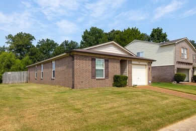 View of front facade featuring a garage and a fron