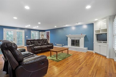 Large, spacious Family Room features gleaming hard