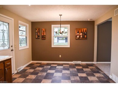 The dining room is open to the kitchen.