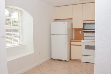 Spacious bright kitchen with a beautiful window fa
