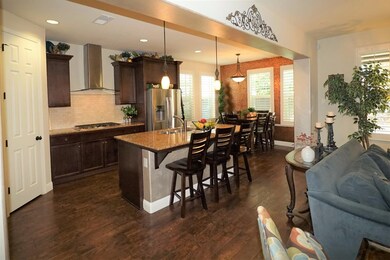 The kitchen opens to the generous size family room