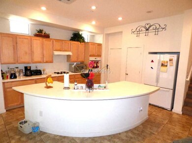 Property Photo. Breakfast bar, lots of cabinets, a