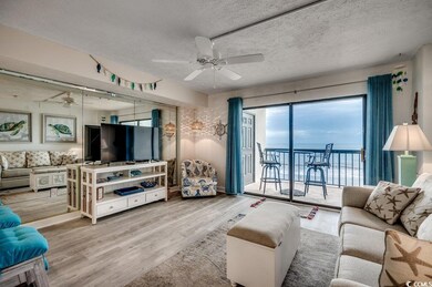 Living room featuring hardwood / wood-style floori