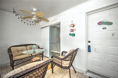 Property entrance with a ceiling fan