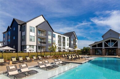 Community pool featuring a patio area