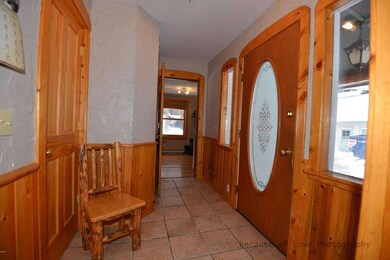 Foyer looking back to third bedroom