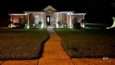 View of front facade featuring a lawn