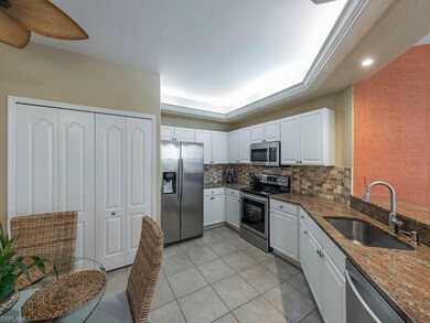 Very newly upgraded kitchen with Stainless appliances and faucet, granite counters, raised panel cabinets, upgraded overhead lighting, ceiling fan, and additional lighting over counter.  Washer & dryer behind folding doors.  All upgrades in past 2-3 