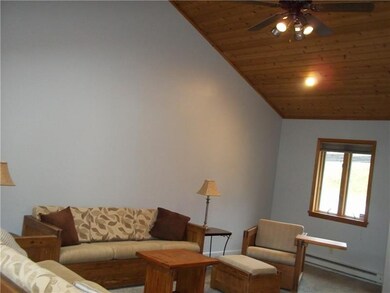 Large living room!  Wooden cathedral ceilings with