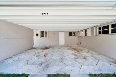 2 car carport with an entrance door