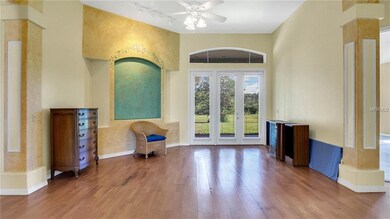 Formal living room with 12' ceilings and French Do