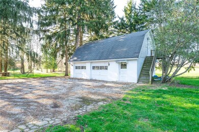 2 car garage with finished room and half bath abov