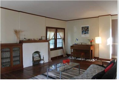 Crown molding, hardwood floors, charming decorativ