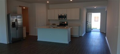 Kitchen with SS appliances and quartz countertops