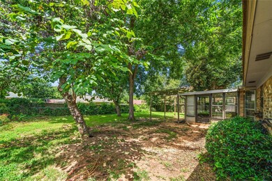 View of yard with a sunroom