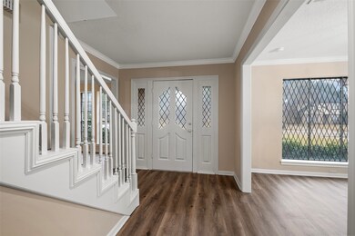 This foyer sets the tone for the entire home, offe