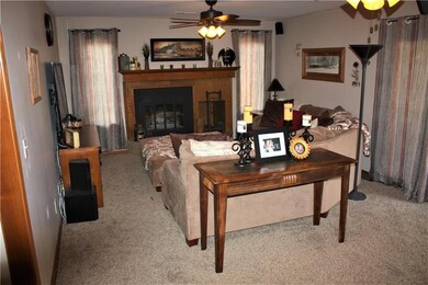 Family room with walk out door to the covered pati