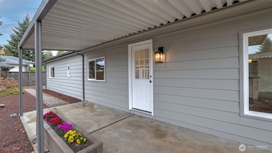 Covered patio new front door and raised Flower Box