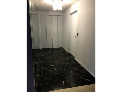 Entry/Foyer. Unit s entry:  Marble flooring, mirro