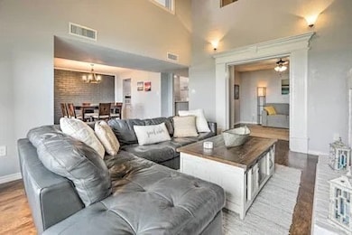 Open to the dining room and kitchen