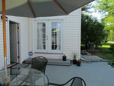 Patio/Deck. French doors from the den open onto th