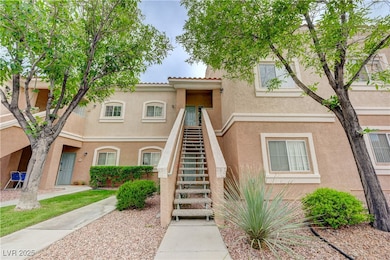 View of property featuring stairs
