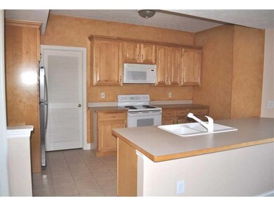 Kitchen. Kitchen w/Stainless Refrigerator & Access