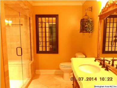 Master Bath with heated travertine floors and walk