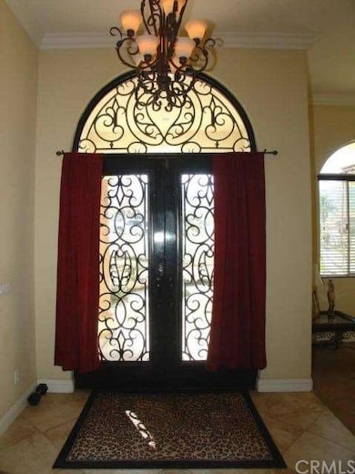 Entry Way with ornate front door!