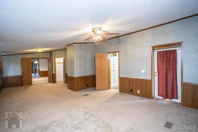 Carpeted, 2 walk-in closets, attached full bath, exit to private covered deck