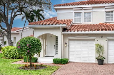 Mediterranean / spanish-style home with a garage