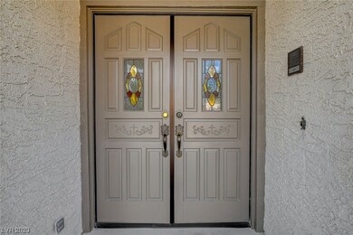 Stained-glass double door entryway.