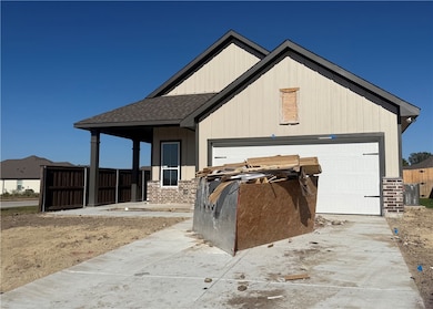 Garage featuring driveway