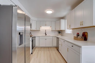 3822 W Quinn Place, Denver, CO 80236 - photo 7