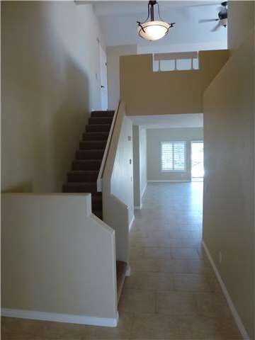 Entry and stairway to upstairs loft and extra atti