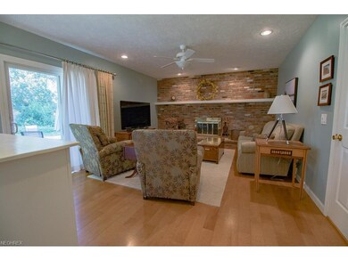 The Family Room offers a fire place and patio door