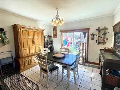 Ceramic tile throughout kitchen / dining / back en