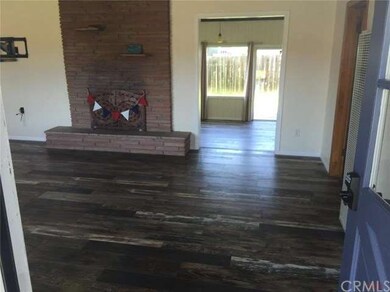 Living Room view from front door and entry to fami
