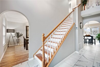 Stunning entryway with newer flooring and soaring